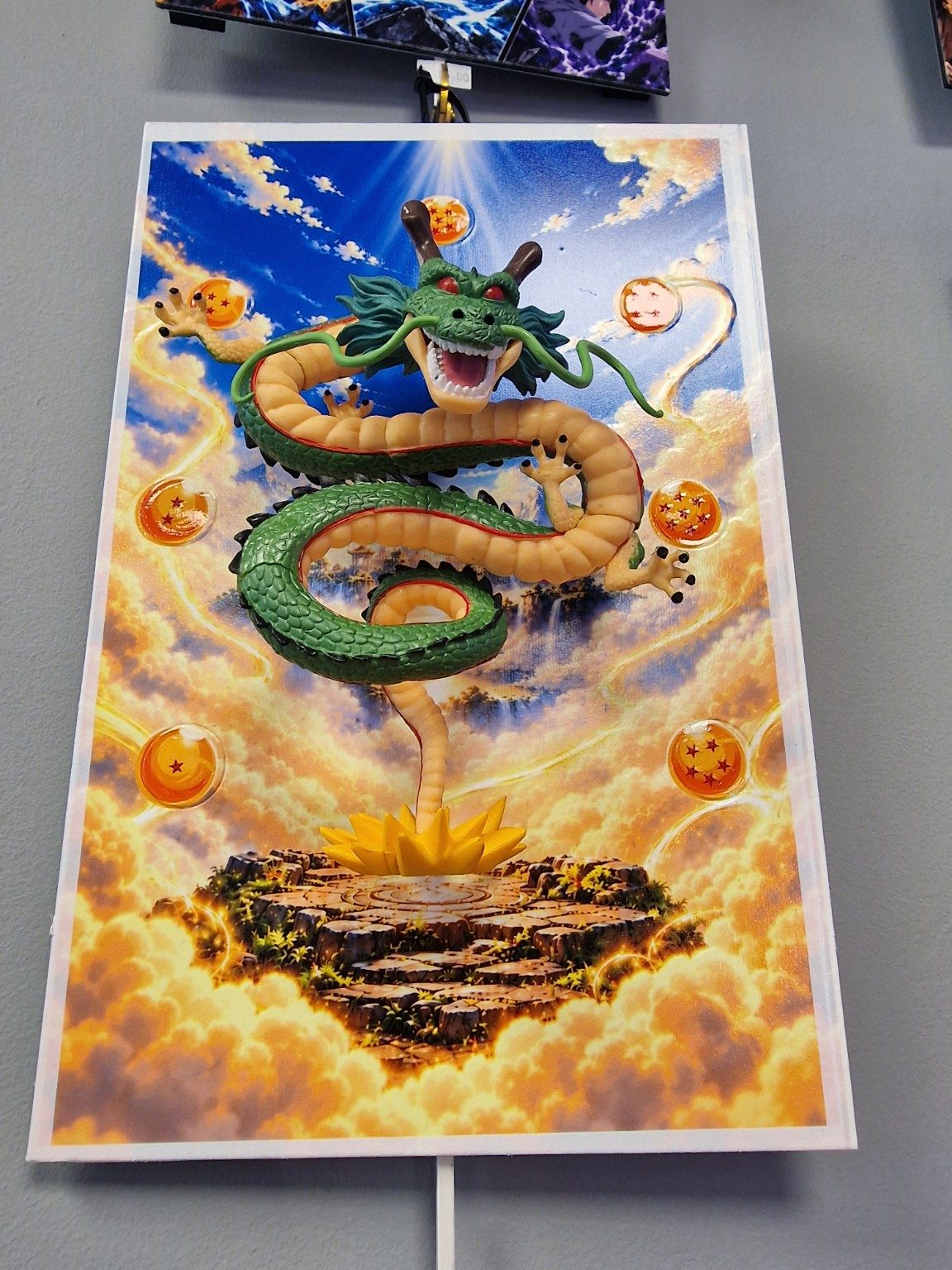 Détail et vue en perspective du tableau Shenron 3D fond en relief